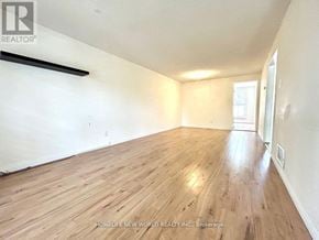 Markham (Markville) apartment for rent - A room with wooden flooring and white walls.