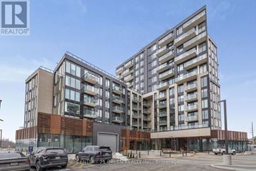Oakville (Jm Joshua Meadows) condo for rent - Two modern buildings are shown with a realtor logo in the corner.