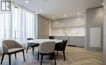 Oakville (Jm Joshua Meadows) condo for rent - A dining room with a table and chairs.