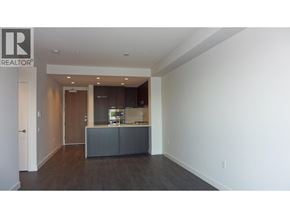 Vancouver apartment for rent - A realtor's office with a desk and a chair.