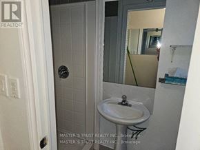 Toronto (Don Valley Village) apartment for rent - A bathroom with a sink and mirror.