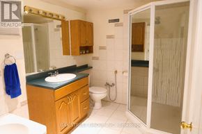 Markham (Royal Orchard) apartment for rent - A bathroom with a sink, toilet, and shower.