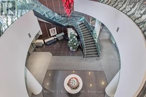 Toronto (Willowdale West) condo for rent - A staircase with a red ribbon on it.