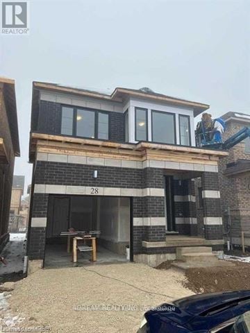 Cambridge apartment for rent - A house under construction with a sign that reads 28.