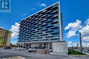 Hamilton (Riverdale) condo for rent - A modern blue building with HomeLife/Miracle Realty Ltd signage in Brokerage.