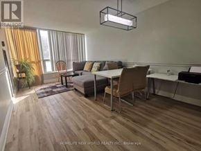 Toronto (Morningside) condo for rent - A modern living room with a dining table and chairs.