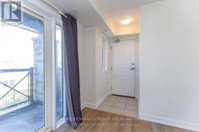 Markham (Cornell) townhouse for rent - A room with a sliding glass door leading to a balcony.