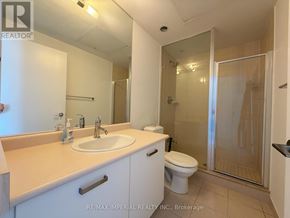Toronto (Bay Street Corridor) condo for rent - A bathroom with a sink, toilet and shower.