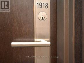 Mississauga (Hurontario) condo for rent - A door handle with the number 1918 on it.