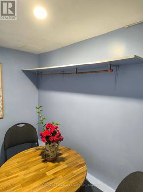 Richmond Hill (Crosby) apartment for rent - A table with a vase of flowers on it in a room.