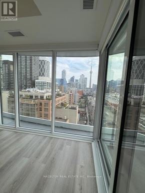 Toronto (Kensington-Chinatown) condo for rent - A view of a city skyline from a high-rise building.