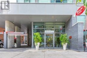 Toronto (Waterfront Communities) condo for rent - The front of a building with a Royal LePage sign on it.