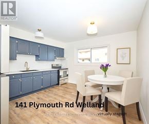 Welland (Lincoln/Crowland) multi-family for rent - A real estate listing photo of a kitchen and dining area.