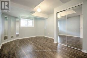 Newmarket (Stonehaven-Wyndham) apartment for rent - A room with wood flooring and a sliding glass door.