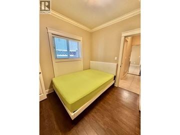 Richmond apartment for rent - A bedroom with a bed and a window.