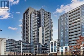 Toronto (Woburn) condo for rent - A modern building complex with a clear blue sky in the background.