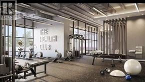 Burnaby apartment for rent - A gym with a sign that says "The Health Club" on the wall.