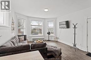 Chatham apartment for rent - A living room with a grey couch and a wooden coffee table.