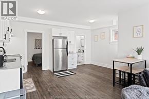 Chatham apartment for rent - A kitchen with a refrigerator, a table, and a couch.