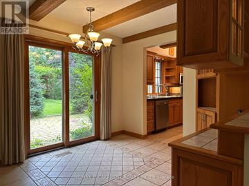 Hamilton (Meadowlands) apartment for rent - A kitchen with wooden cabinets and a tiled floor.
