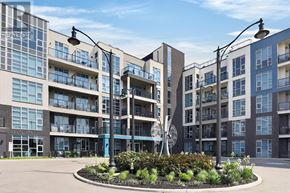 Grimsby (Grimsby Beach) condo for rent - A modern apartment complex with a central garden area.
