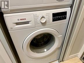 Toronto (Annex) condo for rent - A Bosch washing machine is shown in a laundry room.