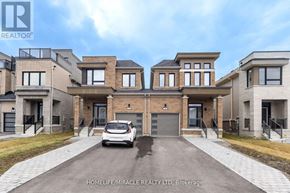 Clarington (Bowmanville) apartment for rent - A white car is parked in front of a house with a sign that says "HOMELIFE/MIRACLE REALTY LTD, Brokerage".