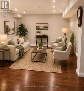 Markham (Middlefield) apartment for rent - A living room with a white couch, a coffee table, and a lamp.