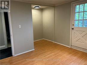 Hamilton (Kirkendall) apartment for rent - A room with a door and a window.