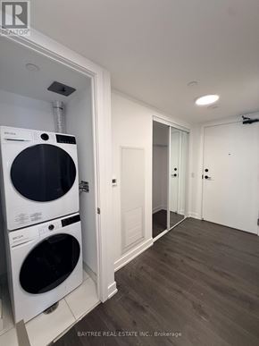 Toronto (Church-Yonge Corridor) condo for rent - A white dryer and washer are in a small laundry room.
