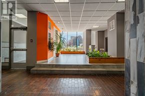 Mississauga (Port Credit) multi-family for rent - A hallway with a plant on the steps.