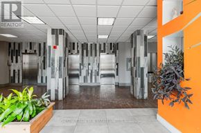 Mississauga (Port Credit) multi-family for rent - A hallway with a plant on the left and a plant on the right.