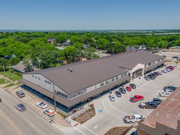 Midlothian apartment for rent - Lawton District building with cars parked in front.