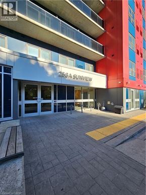 Waterloo condo for rent - The entrance to a building with the sign 25 SALEVIEW.