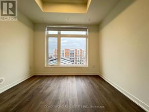 Toronto (Beechborough-Greenbrook) condo for rent - A room with a large window overlooking a cityscape.