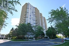 Toronto (Kennedy Park) condo for rent - A tall residential building with a parking lot in front.