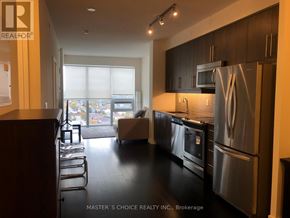 Mississauga (Creditview) condo for rent - A kitchen with a refrigerator, microwave, and oven.