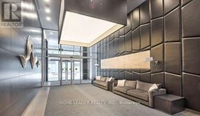 Toronto (Willowdale West) condo for rent - A lobby with a dark wall and a light ceiling.