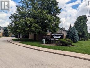 London East (East H) townhouse for rent - A sign for 470 Second Street is in front of a house.