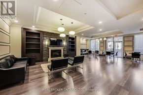 Toronto (Englemount-Lawrence) condo for rent - A spacious living room with a fireplace and a television.