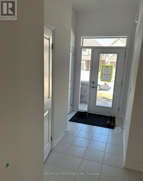 Centre Wellington (Fergus) townhouse for rent - A hallway with a door at the end.