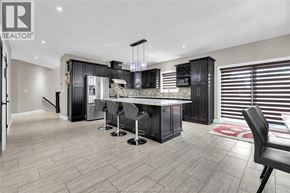 Lasalle apartment for rent - A modern kitchen with a dining area and a large island.