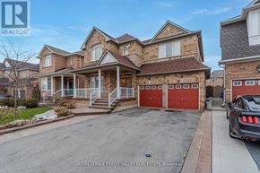 Brampton (Sandringham-Wellington) apartment for rent - A large house with a car parked in front.