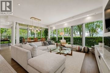 Vancouver apartment for rent - A modern living room with a large sectional sofa and a coffee table.
