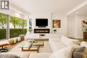 Vancouver apartment for rent - A modern living room with a fireplace and a flat screen TV.