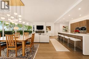 Vancouver apartment for rent - A modern kitchen with a dining table and chairs.