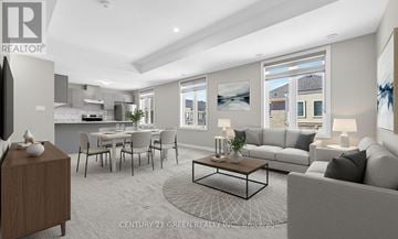 Hamilton (Waterdown) townhouse for rent - A modern living room with a grey sofa and a wooden sideboard.