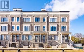 Hamilton (Waterdown) townhouse for rent - A building with the logo REALTOR on the top left corner.