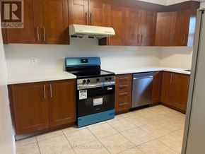 Richmond Hill (Crosby) apartment for rent - A kitchen with a stove top oven and a dishwasher.
