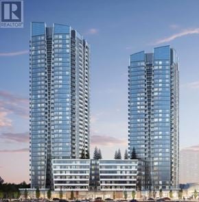 Vaughan (Brownridge) condo for rent - Two tall buildings with glass windows are shown in the image.